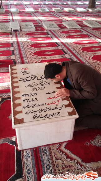شهید مدافع حرم حسینعلی پور ابراهیمی بر مزار سردار شهید مهدی خوش سیرت«جانشین لشگر قدس گیلان»+عکس